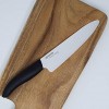 Kyocera Advanced Ceramic Revolution Series 7-inch Professional Chef's Knife Black Handle White Blade